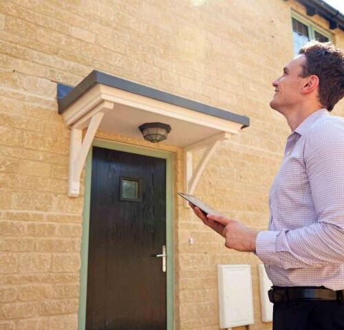 how to buy a house through your business uk