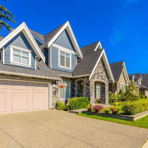 can a business buy a house