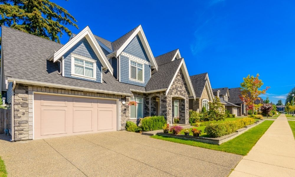 can a business buy a house